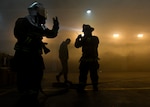 Firefighters from the 51st Civil Engineering Squadron respond to a simulated warehouse fire during Exercise Beverly Herd 17-1, February 27, 2017, at Osan Air Base, Republic of Korea. The simulation was executed to better equip members of Team Osan with the knowledge and experience to carry out and sustain the mission and operations with our Republic of Korea allies.