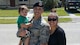 Tech. Sgt. Jose Rosado, assigned to the 482nd Security Forces Squadron, Homestead Air Reserve Base, Fla., stands with mother Janelly Rivera and baby Rivera after he saved their lives when their car went into a canal along with father John Rivera on Jan. 29, 2016. (U.S. Air Force photo/Senior Airman Aja Heidan)