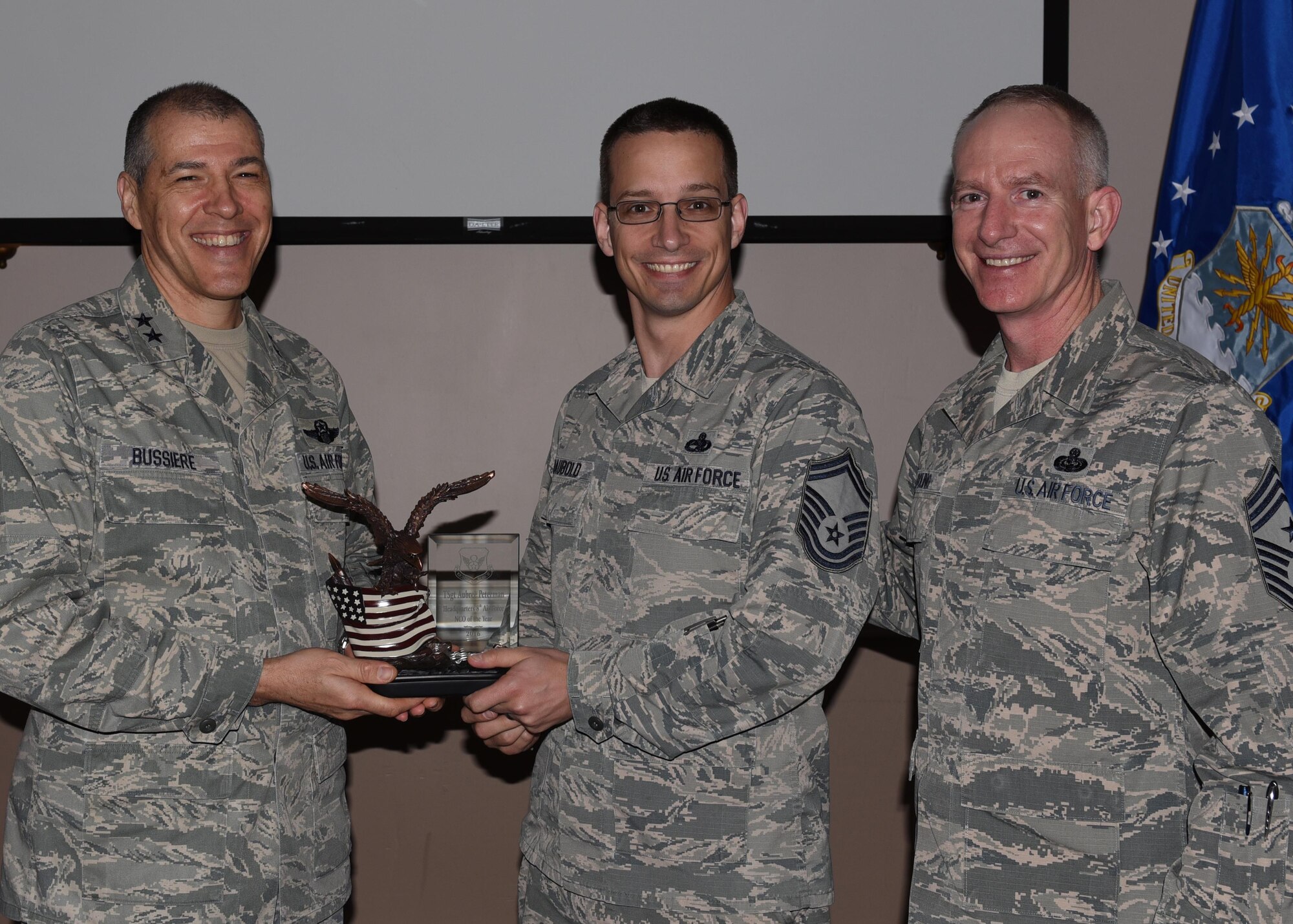 U.S. Air Force Tech. Sgt. Aubree Peterman, Detachment 4, (not pictured), is named Noncommissioned of the Year during the 2016 Headquarters Eighth Air Force Annual Awards ceremony at Barksdale Air Force Base, La., Feb. 27, 2017. Maj. Gen. Thomas Bussiere, Eighth Air Force commander, and Chief Master Sgt. Alan Boling, Eighth Air Force command chief, presented awards to Airmen and civilians assigned to Headquarters Eighth Air Force to recognize their professionalism and successes throughout the year. (U.S. Air Force photo by Senior Airman Erin Trower)