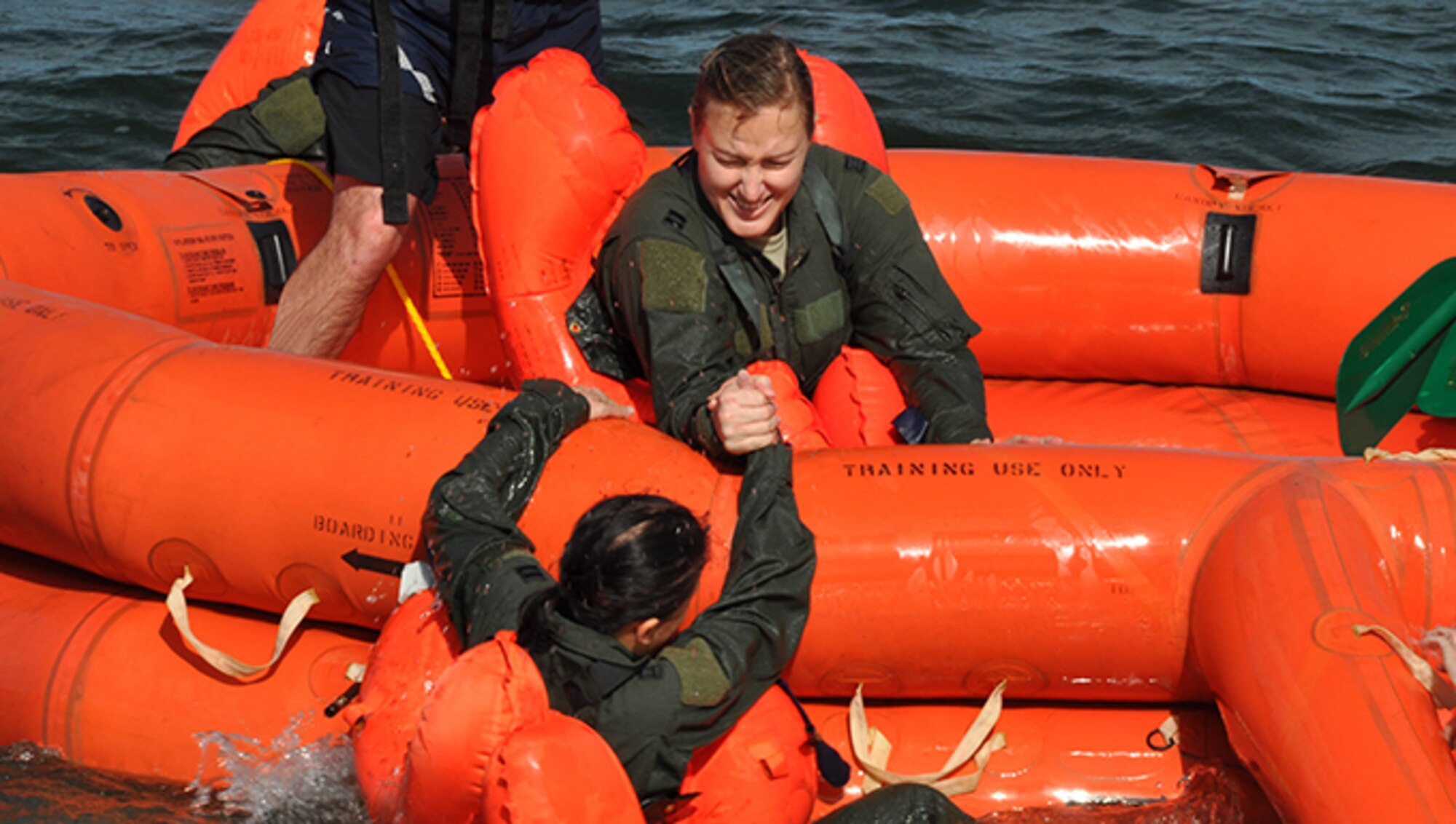 Members of the 94th Operations Group participate in Water Survival Training at Naval Air Station Key West, Florida February 23, 2017. During the two-day Survival, Evasion, Resistance and Escape course, members also completed Self Aid Buddy Care and combat survival. According to Col. Patrick Campbell, 94th Operations Group commander, this marks the first time this training has completed by aircrew, aeromedical and aircrew flight equipment personnel at the same time. (U.S. Air Force photo/Master Sgt. James Branch)