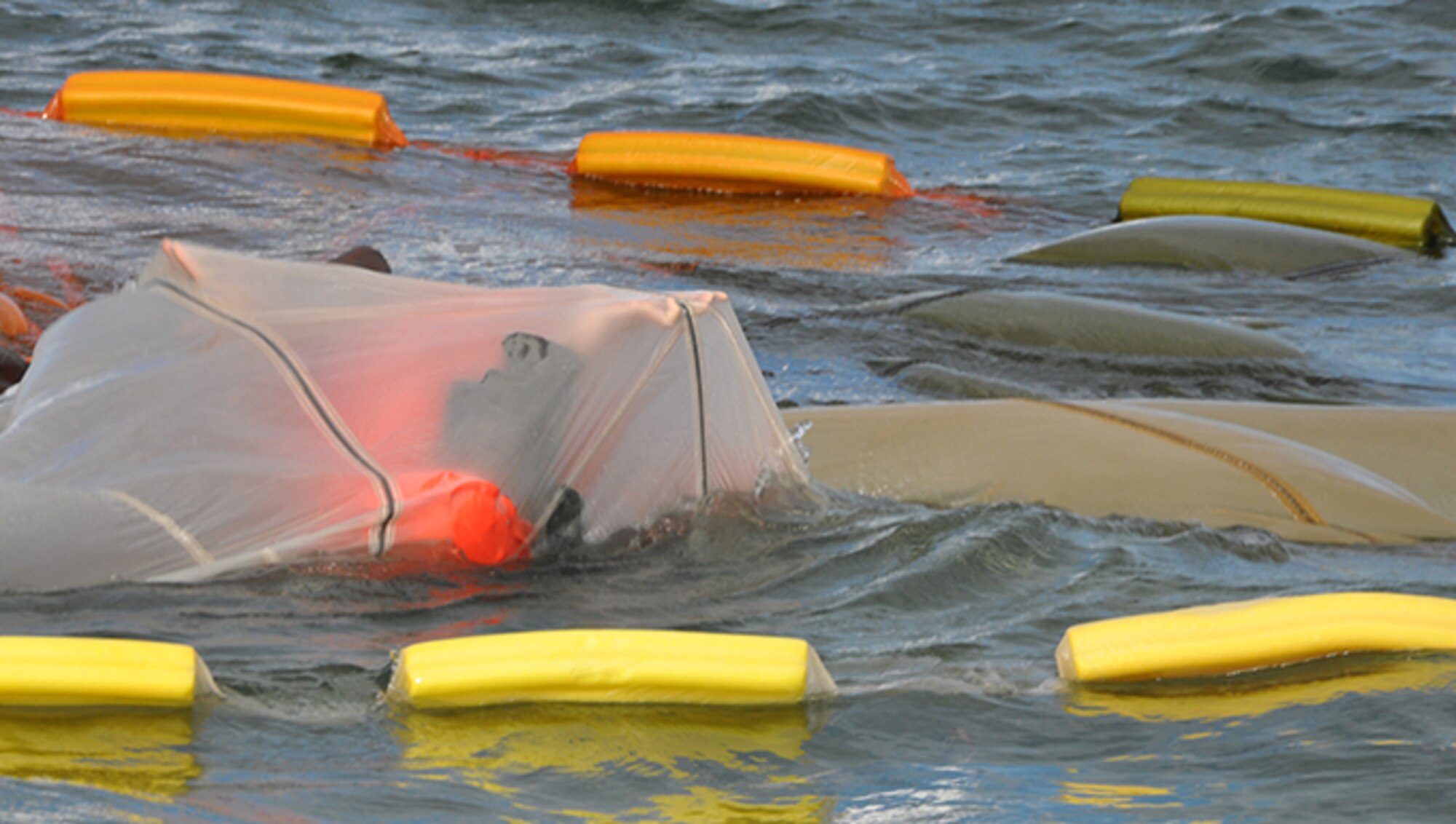 Members of the 94th Operations Group participate in Water Survival Training at Naval Air Station Key West, Florida February 23, 2017. During the two-day Survival, Evasion, Resistance and Escape course, members also completed Self Aid Buddy Care and combat survival. According to Col. Patrick Campbell, 94th Operations Group commander, this marks the first time this training has completed by aircrew, aeromedical and aircrew flight equipment personnel at the same time. (U.S. Air Force photo/Master Sgt. James Branch)