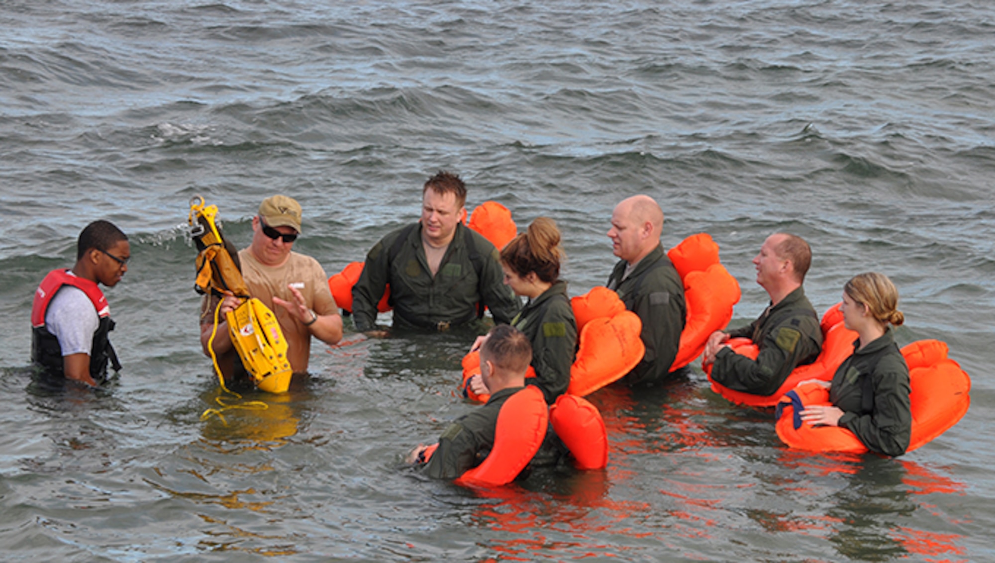 Members of the 94th Operations Group participate in Water Survival Training at Naval Air Station Key West, Florida February 23, 2017. During the two-day Survival, Evasion, Resistance and Escape course, members also completed Self Aid Buddy Care and combat survival. According to Col. Patrick Campbell, 94th Operations Group commander, this marks the first time this training has completed by aircrew, aeromedical and aircrew flight equipment personnel at the same time. (U.S. Air Force photo/Master Sgt. James Branch)
