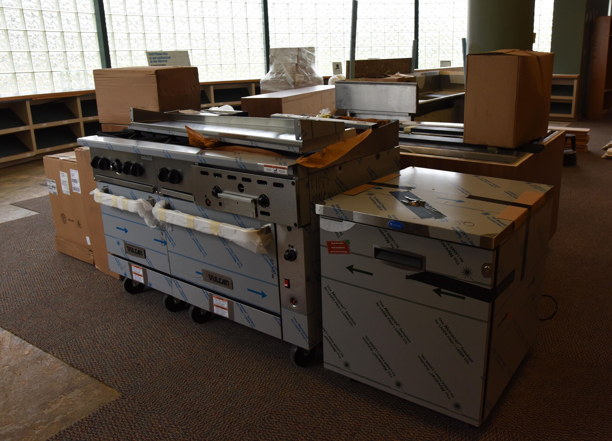 Kitchen appliances sit ready for installation at the McBride Commons Feb. 15, 2017, on Keesler Air Force Base, Miss. The McBride Commons renovation project will transition the former base library into a common area for those with base access, which will include a children’s library, computer stations, engraving, framing, marketing and print shops and a full kitchen. The planned completion date for the nine-month project is May 2017. (U.S. Air Force photo by Kemberly Groue)