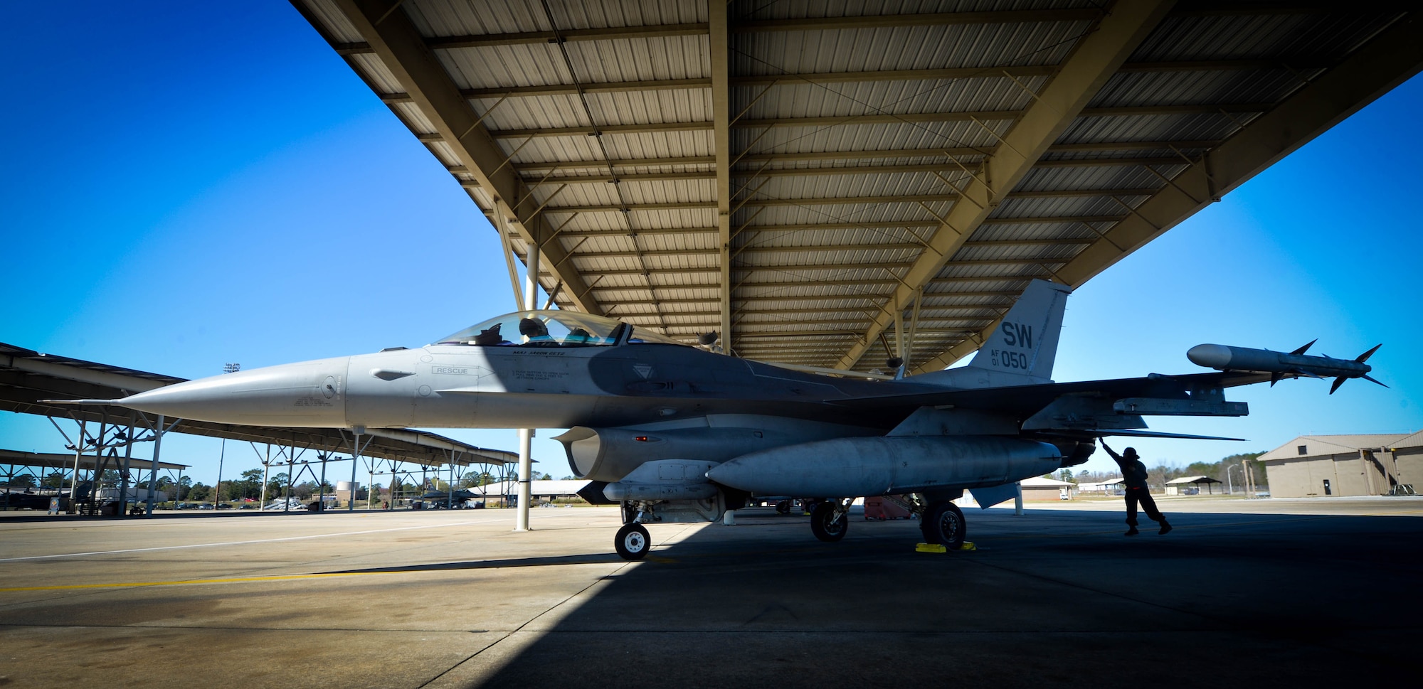 U.S. Air Force Airman 1st Class Victoria Suarez, 20th Aircraft Maintenance Squadron tactical aircraft maintainer, inspects an F-16CM Fighting Falcon on Shaw Air Force Base, S.C., Feb. 26, 2017. Tactical aircraft maintainers are responsible for the maintenance, upkeep, launch and recovery of the aircraft to ensure they are ready to takeoff at a moment’s notice. (U.S. Air Force photo by Senior Airman Michael Cossaboom)