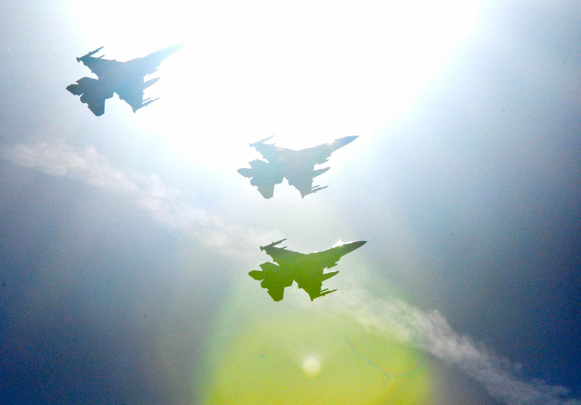 Three U.S. Air Force F-16CM Fighting Falcons assigned to the 77th Fighter Squadron fly over Arlington National Cemetery, Virginia, Feb. 24, 2017. The flyover was performed in memory of retired Air Force Col. Thomas Schaefer, who passed away May 31, 2016, and the five Airmen and three Marines who lost their lives attempting to save Schaefer and other hostages. (Courtesy Photo)