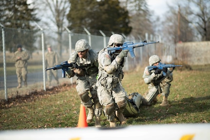 Soldiers from the 77th Sustainment Brigade practice casualty evacuation at the brigade level Best Warrior Competition Feb. 3, 2017.