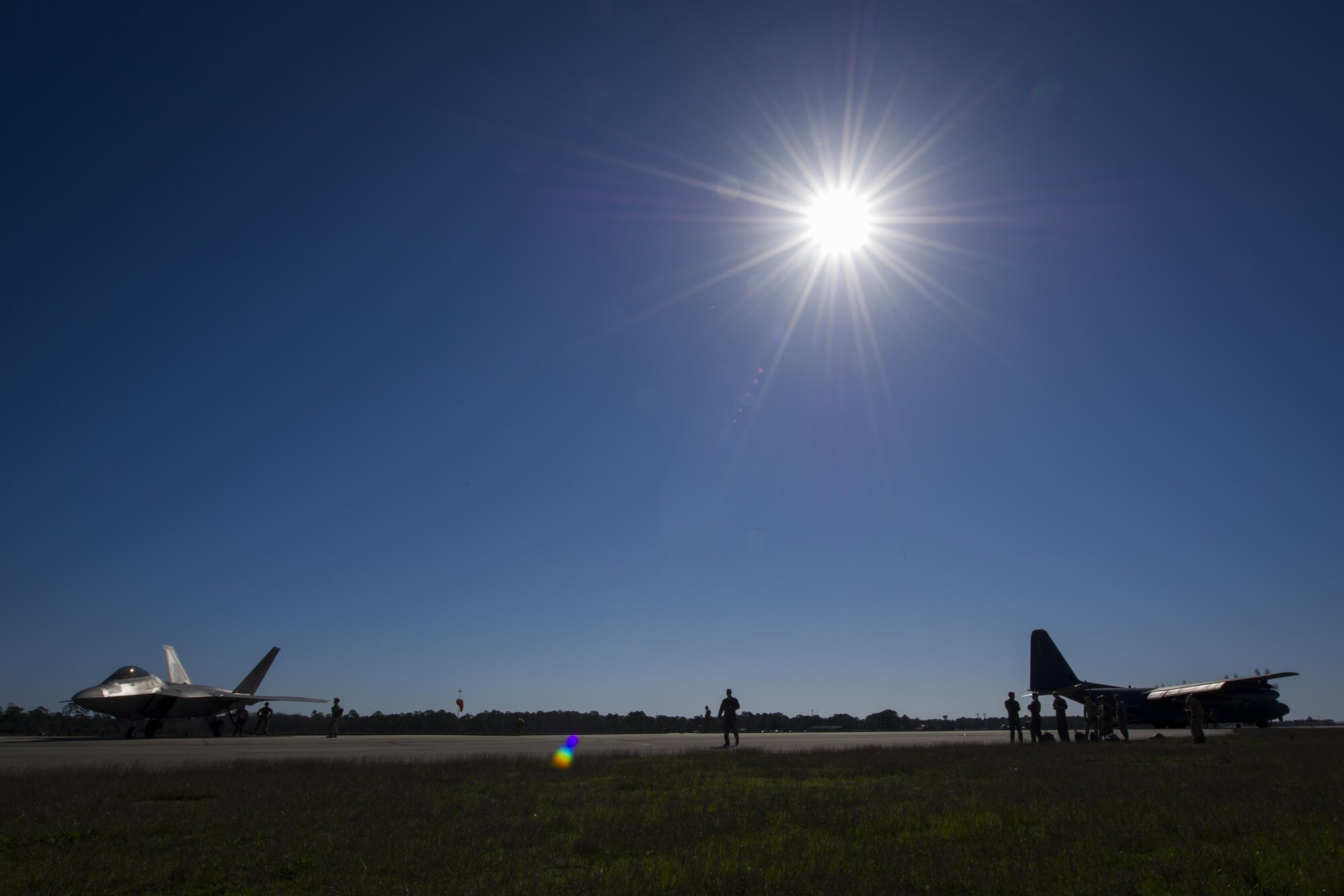 Forward area refueling point Airmen with the 1st Special Operations Logistic Readiness Squadron conduct a FARP operation at Hurlburt Field, Fla., Feb. 26, 2017. The FARP program is a United States Special Operations Command initiative that trains petroleum, oils and lubrication Airmen to perform covert, nighttime refueling operations in deployed locations where fueling stations are not accessible or when air-to-air refueling is not possible. FARPs provide the ability to ensure an aircraft’s global reach capabilities are met to accomplish the mission. Three F-22 Raptors assigned to the 95th Fighter Squadron, Tyndall Air Force Base, Fla., received fuel from an MC-130J Commando II tanker assigned to the 9th Special Operations Squadron, Cannon AFB, N.M. (U.S. Air Force photo by Airman 1st Class Joseph Pick)