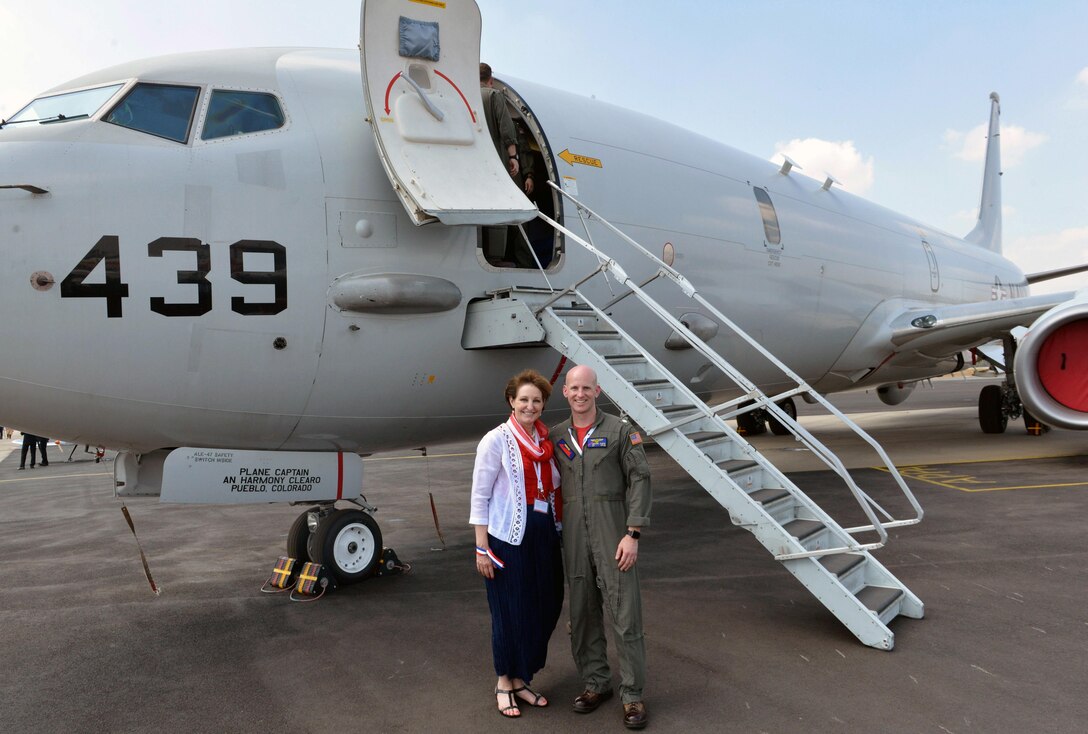 MaryKay Carlson, Charge d'Affaires of the U.S. Mission to India, stands outside a U.S. Navy P-8 Poseidon with U.S. Navy Commander Mike Albus, pilot and Executive Officer for Fixed Wing Patrol Squadron 10, Naval AIr Station Jacksonville, Fla., as part of Aero India 2017 at Air Force Station Yelahanka, India Feb. 16, 2017. The United States participates in air shows and other regional events to demonstrate its commitment to the security of the Indo-Asia-Pacific region, promote the standardization and interoperability of equipment, and display capabilities critical to the success of current and future military operations. (U.S. Air Force photo by Capt. Mark Lazane)