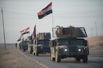 An Iraqi Counter Terrorism Service convoy moves towards Mosul, Iraq, Feb. 23, 2017.  The breadth and diversity of partners supporting the Coalition demonstrate the global and unified nature of the endeavor to defeat ISIS in Iraq and Syria.  Combined Joint Task Force – Operation Inherent Resolve is the global Coalition to defeat ISIS in Iraq and Syria.  (U.S. Army photo by Staff Sgt. Alex Manne)
