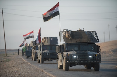 An Iraqi Counter Terrorism Service convoy moves towards Mosul, Iraq, Feb. 23, 2017.  The breadth and diversity of partners supporting the Coalition demonstrate the global and unified nature of the endeavor to defeat ISIS in Iraq and Syria.  Combined Joint Task Force – Operation Inherent Resolve is the global Coalition to defeat ISIS in Iraq and Syria.  (U.S. Army photo by Staff Sgt. Alex Manne)