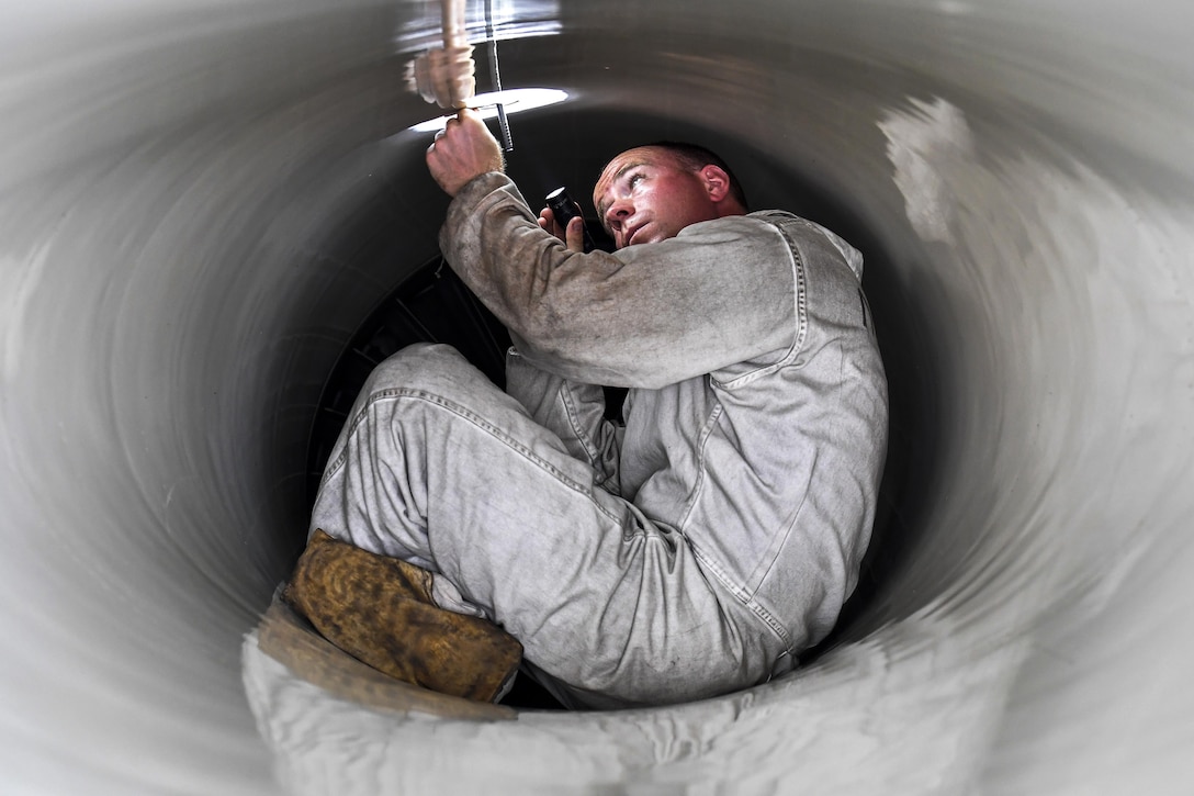 Air Force Staff Sgt. Todd Hughes checks the anti-ice detector during an intake inspection on an F-16C at Daytona Beach, Fla., Feb. 24, 2017. The Thunderbirds, the Air Force's demonstration squadron, performed the flyover during the opening ceremonies of the Daytona 500 race. Hughes is a dedicated crew chief assigned to the team. Air Force photo by Tech. Sgt. Christopher Boitz