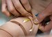 An IV is inserted into a simulated patient at the 51st Medical Group as part of Exercise Beverly Herd 17-1 at Osan Air Base, Republic of Korea, Feb. 28, 2017. One of the scenarios during this exercise saw the simulated cutting of all electronic communications to the medical group, requiring the medics to provide the same level of care to Team Osan without the convenience of modern technologies. (U.S. Air Force photo by Airman 1st Class Gwendalyn Smith)