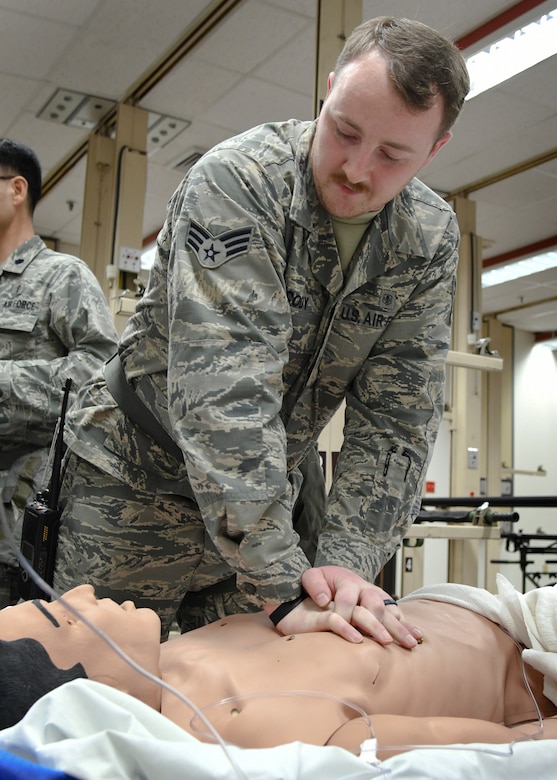 U.S. Air Force Senior Airman John Cody, 51st Medical Operations Squadron medical technician, performs cardiopulmonary resuscitation on a simulated patient as part of Exercise Beverly Herd 17-1 at Osan Air Base, Republic of Korea, Feb. 28, 2017. Medics from the 51st MDG use exercises like Beverly Herd to prepare themselves for real-world contingency operations. (U.S. Air Force photo by Airman 1st Class Gwendalyn Smith)