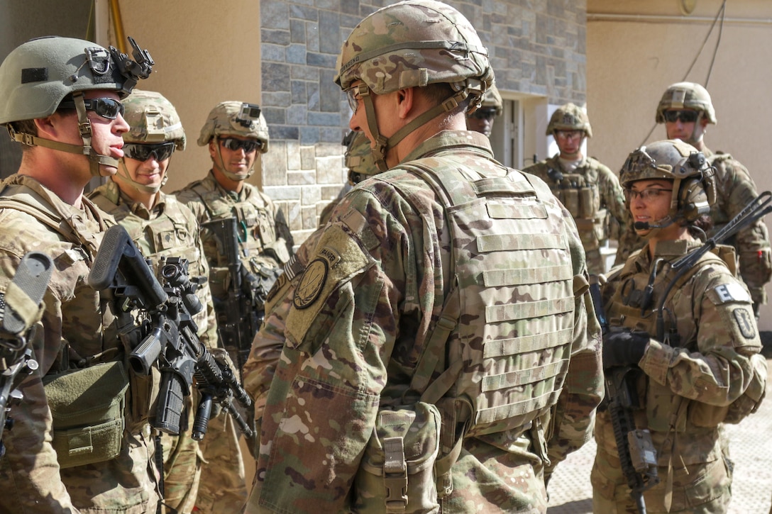 U.S. Army Lt. Gen. Stephen Townsend, center, commanding general, Combined Joint Task Force-Operation Inherent Resolve and XVIII Airborne Corps, visits Soldiers stationed at tactical assembly area Hamam al-Alil, Iraq, Feb. 22, 2017. Paratroopers of the 2nd Brigade Combat Team, 82nd Airborne Division, deployed in support of CJTF-OIR, moved a force into Hamam al-Alil to continue support to the Iraqi federal police during the offensive to liberate West Mosul. The Falcon Brigade enables their Iraqi security forces partners through the advise and assist mission, contributing planning, intelligence collection and analysis, force protection, and precision fires to achieve the military defeat of ISIS. CJTF-OIR is the global Coalition to defeat ISIS in Iraq and Syria. (U.S. Army photo by Staff Sgt. Jason Hull)