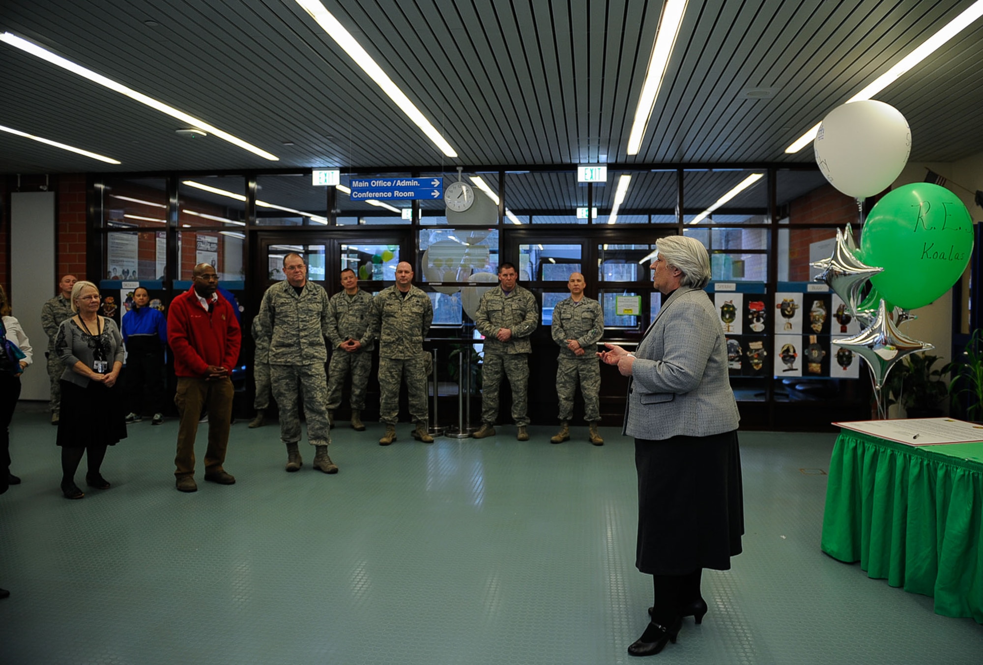 Unit commanders and administrators gather at an Adopt-a-School Program signing at Ramstein Elementary School on Ramstein Air Base, Germany, Feb. 24, 2017. The Adopt-a-School Program has proven to be a great platform that has allowed our military units and some of our incredible Airmen to forge strong partnerships with our schools in the Kaiserslautern Military Community. (U.S. Air Force photo by Airman 1st Class Savannah L. Waters)