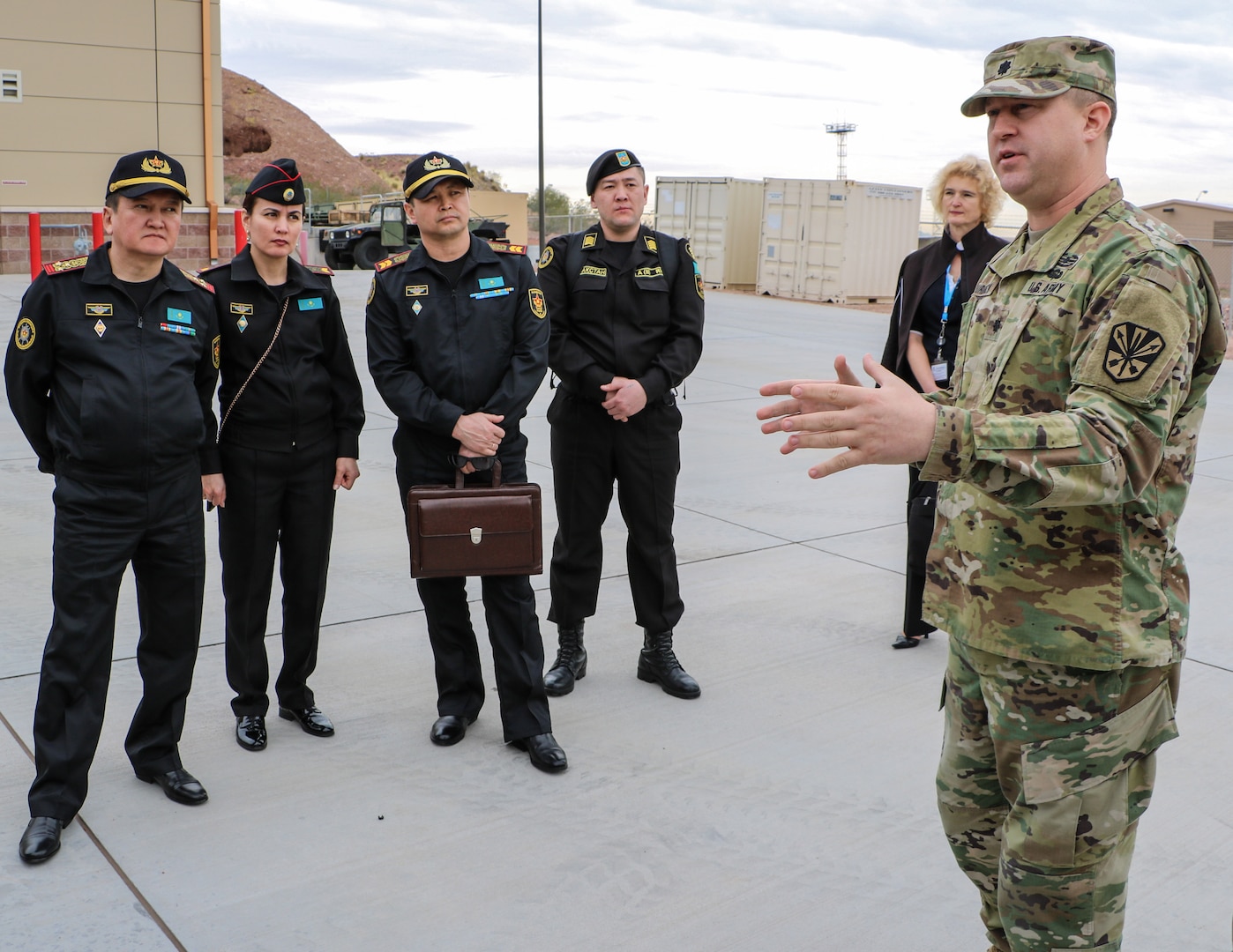 Lt. Col. Joe Murdock, commander of the 850th Military Police Battalion, discusses the role of the non-commissioned officer in military police operations to a delegation of Kazakh military officers and enlisted personnel during a State Partnership Program sponsored visit to the Papago Park Military Reservation Feb. 6 - 10. Aside from meeting with key leadership, the delegation also toured training facilities and ranges in Phoenix and Florence, focusing on the infrastructure that develops and maintains the capabilities of Arizona Guard MP's. (U.S. Army National Guard photo by Maj. Kevin Budak)