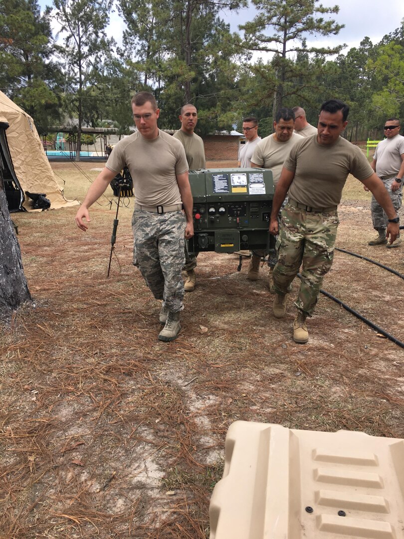 Personnel from Joint Task Force-Bravo’s U.S. Southern Command Situational Assessment Team (SSAT) transport a generator during the set up of a deployment readiness exercise in Zambrano, Honduras, Feb. 21 through 23. The SSAT is a quick-reaction deployable team comprised of experts that provide the commander of USSOUTHCOM an immediate assessment of conditions and unique Department of Defense requirements which might be needed during a Humanitarian Assistance, Disaster Response event within the Central American Area of Responsibility. 
