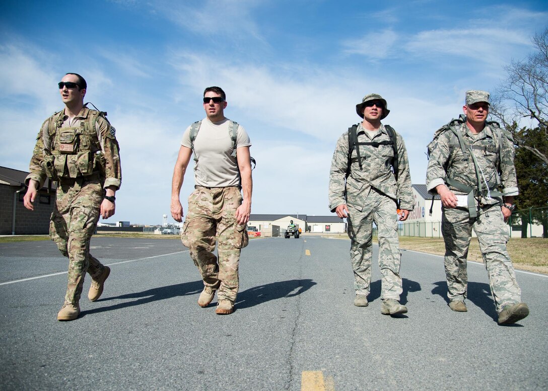 Participants of the 18th Annual Security Forces Ruck March approach the final stretch of the 10-kilometer course Feb. 25, 2017, on Dover Air Force Base, Del. Participants’ registration fees were donated to the Korean War Veterans Association of Delaware. (U.S. Air Force photo by Mauricio Campino)