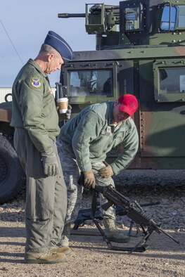 Lt. Gen. Mark Kelly, 12th Air Force (Air Forces Southern) Commander, views a combat arms presentation Feb. 24, 2017, at Mountain Home Air Force Base, Idaho. Kelly was given several demonstrations on the tools used by Security Forces, including the StressVest. (U.S. Air Force photo by Airman Jeremy D. Wolff/Released)