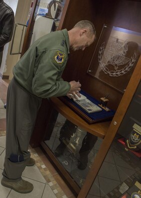 Lt. Gen. Mark Kelly, 12th Air Force (Air Forces Southern) Commander, signs the guest book at the 428th Fighter Squadron Feb. 23, 2017, at Mountain Home Air Force Base, Idaho. The book is reserved to log the visits of any notable figures who tour the squadron. (U.S. Air Force photo by Airman Jeremy D. Wolff/Released)