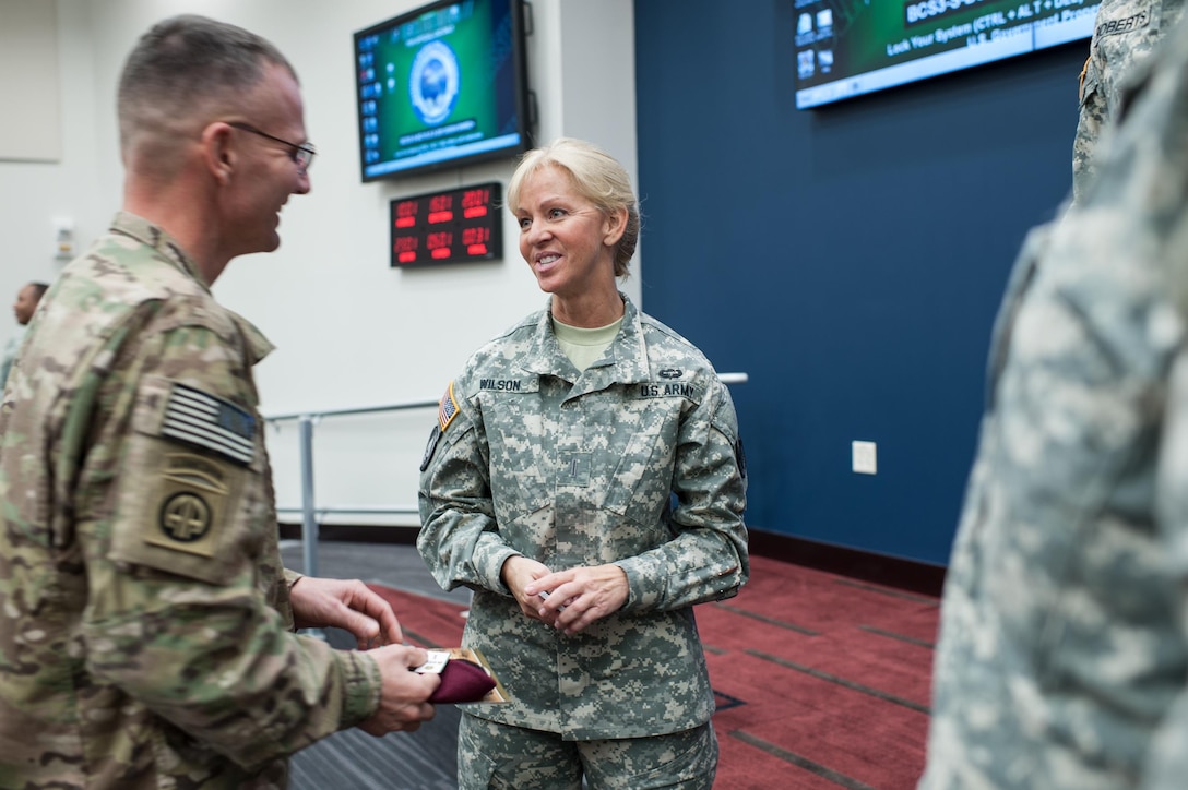 Chief Warrant Officer 5 Phyllis J. Wilson, the Command Chief Warrant Officer of the U.S. Army Reserve, holds a warrant officer professional development session hosted by the 82nd Airborne Division at Fort Bragg, N.C., Dec. 13, 2013. She shared information on the Warrant Officer Civilian Education Program, Senior Warrant Officer Council's efforts to develop strong and adaptive leaders, converting from active to reserve service, and the Army profession and military expertise. Wilson is no stranger to Fort Bragg having served in the XVIII Airborne Corps as an signals intelligence collection manager early in her military career. 