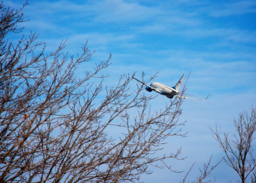An Air Force Reserve Command C-40C plane makes an approximately ten degree banking turn adjustment after takeoff, just like the Air Force song describes the action, "Off we go into the wild blue yonder, flying high into the sun." This C-40C distinguished visitor aircraft, belonging to the 932nd Airlift Wing at Scott Air Force Base, Illinois, took off on another mission "into the blue" recently. Originally, the Air Force song was titled "Army Air Corps". Robert Crawford wrote the lyrics and music during 1938 and then during World War II, the service was renamed "Army Air Force", and the song title changed to agree. In 1947, when the Air Force became a separate service, the song became the "Air Force Song" and is now used in many ceremonies at the 932nd Airlift Wing, such as promotions and retirements. (U.S. Air Force photo by Lt. Col. Stan Paregien) 
