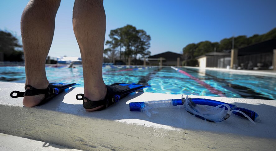 A swimmer prepares to get in the pool at the aquatic center, Hurlburt Field, Fla., Feb. 14, 2017. Hurlburt Field’s Aquatic Center pool deck and bathrooms were recently renovated and a handicap lift was added to provide a safer environment for all pool members. (U.S. Air Force photo by Airman 1st Class Dennis Spain)