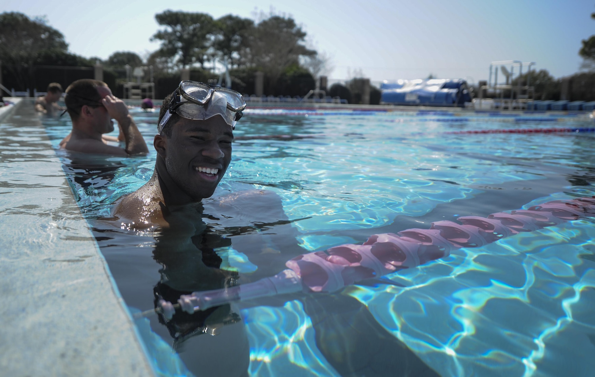An Air Commando uses the pool at the aquatic center on Hurlburt Field, Fla., Feb. 14, 2017. The Hurlburt Field Aquatic Center reopened Feb. 1, 2017, after renovations were made to the pool deck and bathrooms, and a handicap lift was installed. (U.S. Air Force photo by Airman 1st Class Dennis Spain)