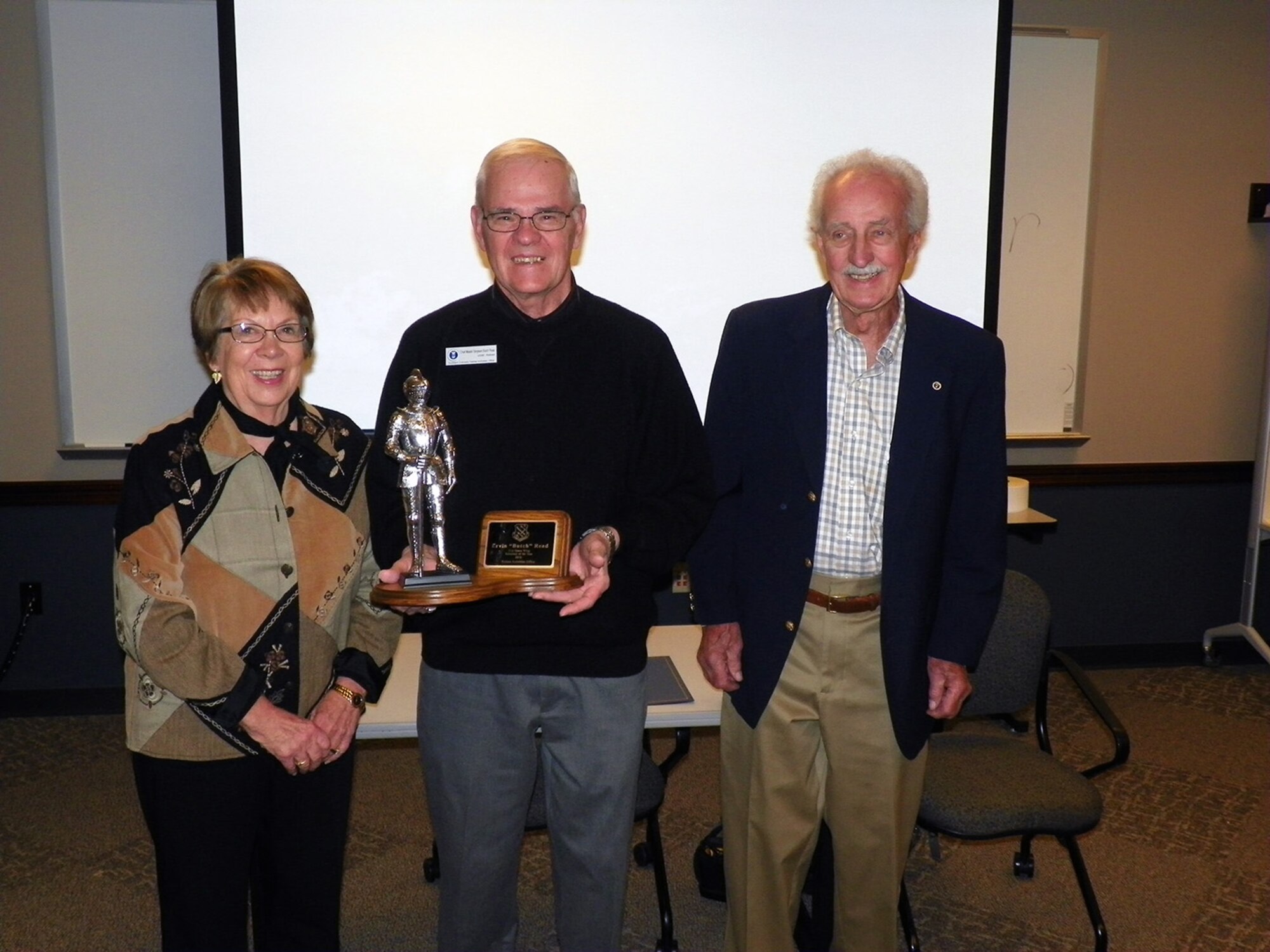 PETERSON AIR FORCE BASE, Colo. – Alongside his wife Rita Read (left) and Sgt. Maj. retired Ted Gembczynski, Chief Master Sgt. retired Butch Read (center) Southern Colorado Retiree Activities Office volunteer was awarded the 21st Space Wing Volunteer of the Year Annual Award at Peterson Air Force Base, Feb. 9, 2017. The award is given to a volunteer who performs outstanding service throughout the year. (courtesy photo)