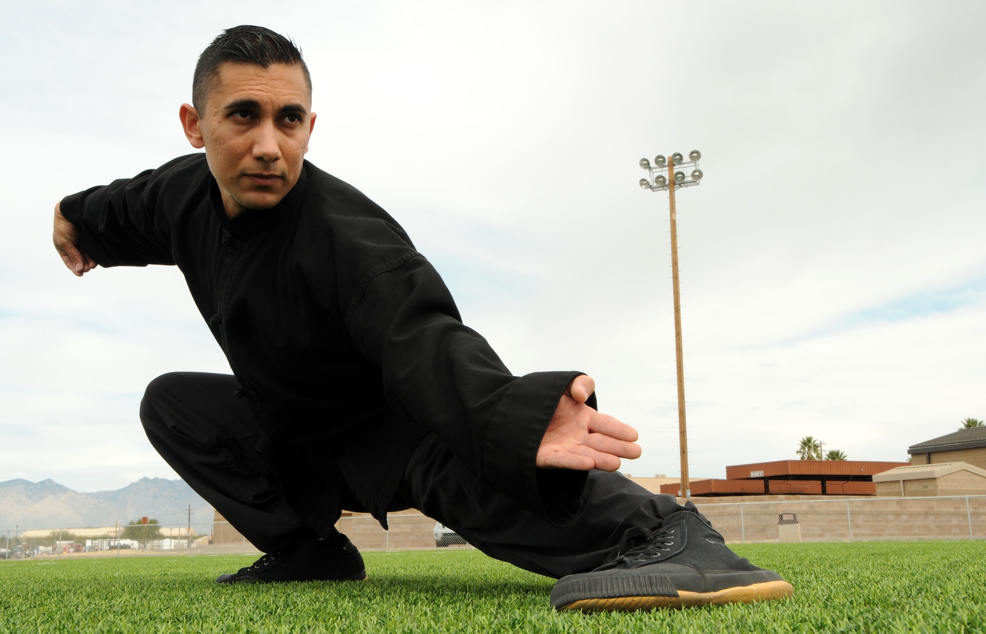 Senior Airman Michael Bonit, 47th Fighter Squadron aircrew flight equipment technician, practices his martial art at Davis-Monthan Air Force Base, Ariz, February 12, 2017. Bonit’s favorite type of martial arts is Jeet Kune Do created by Bruce Lee. (U.S. Air Force photo by Tech. Sgt. Courtney Richardson)
