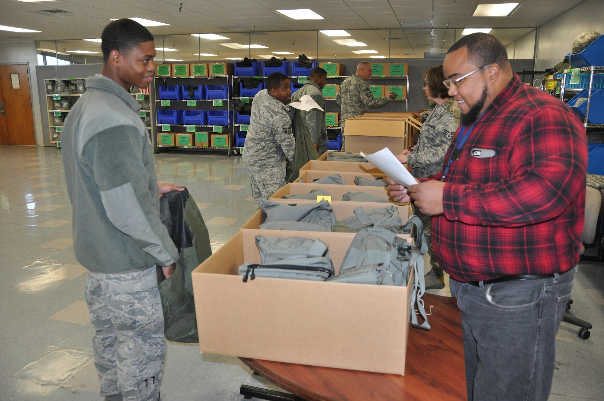 Airmen from the 908th Airlift Wing’s Logistics Readiness Squadron partnered with members of the 42nd Airbase Wing’s LRS to issue supplies and equipment to 908th members slated to deploy this year Jan. 8 at Maxwell Air Force Base. The partnership between the 908th and the 42nd is vital to mission success on Maxwell. (U.S. Air Force photo by Bradley J. Clark)