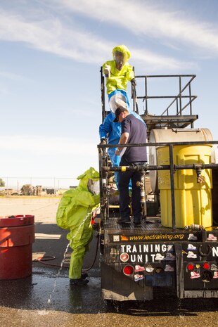Simulated spills and leaks are repaired by firefighters during hazardous materials response training held aboard Marine Corps Logistics Base Barstow, Calif., Feb. 15.