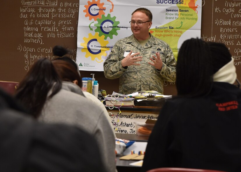 Master Sgt. John Rude, a unit training manager for the 76th Aerial Port Squadron, speaks to high school students at a Junior Achievement event at Choffin Career and Technical Center, Feb. 24, 2016. Youngstown Air Reserve Station has an active speakers bureau with Air Force Reserve, Navy Reserve and Marine Corps Reserve members performing dozens of speeches at community functions annually. (U.S. Air Force photo/Eric White)