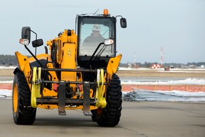 Ricky Bass, Big Top Manufacturing Company lead technician, drives a forklift at Joint Base Langley-Eustis, Va., Jan. 12, 2017. The 633rd Contracting Squadron helps units at JBLE sponsor projects that are essential for the mission. (U.S. Air Force photo by Airman 1st Class Kaylee Dubois)