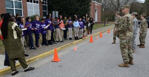U.S. Army Soldiers from Joint Base Langley-Eustis, Va., answer students’ questions during a career fair at Crittenden Middle School in Newport News, Va., Feb. 22, 2017. The career fair served to demonstrate how science, technology, engineering and mathematics are incorporated into various career fields in the local community and the Armed Forces. (U.S. Air Force photo by Staff Sgt. Teresa J. Cleveland)