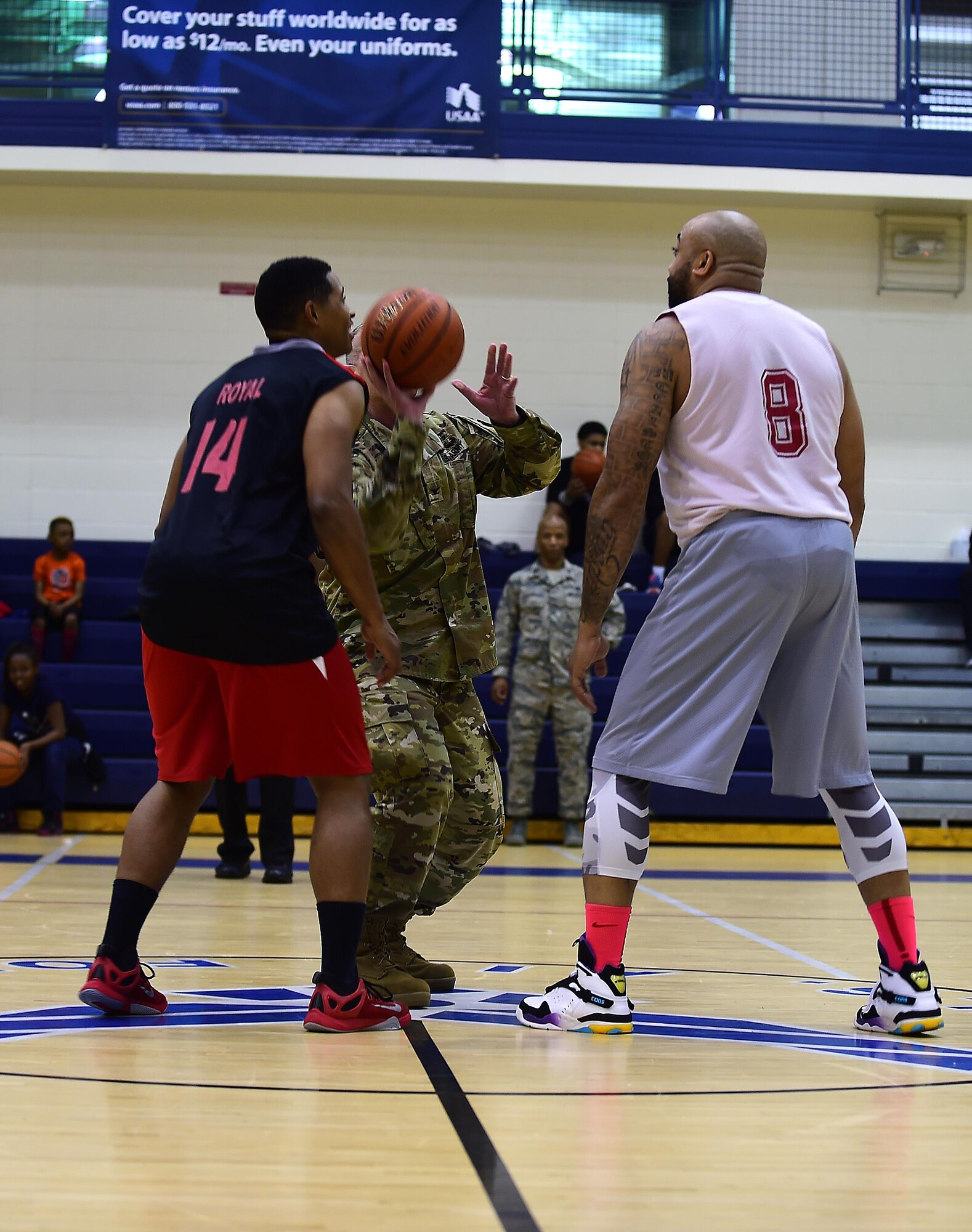 U.S. Army Col. Herbert Joliat, 633rd Air Base Wing incoming vice commander, tosses the tip-off ball during the 2016-2017 intramural basketball championship game at Joint Base Langley-Eustis, Va., Feb. 22, 2017. The championship game featured the 633rd Force Support Squadron and the Ryan Center teams. (U.S. Air Force photo by Senior Airman Kimberly Nagle)