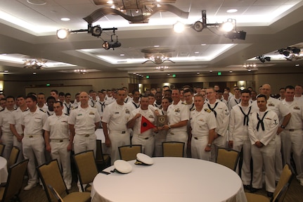 HONOLULU, Hawaii  (Jan. 27, 2017) -- Cmdr. Gabe Anseeuw, commanding officer of USS Greeneville (SSN 772) receives a Battle Efficiency award on behalf of the crew from Capt. Rick Seif, Commander of Squadron ONE Jan. 27, 2017 at the Hale Koa hotel in Honolulu.