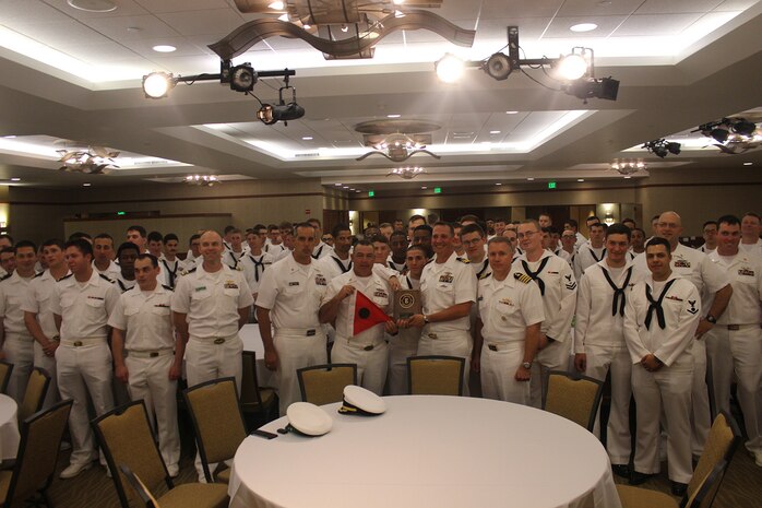 HONOLULU, Hawaii  (Jan. 27, 2017) -- Cmdr. Gabe Anseeuw, commanding officer of USS Greeneville (SSN 772) receives a Battle Efficiency award on behalf of the crew from Capt. Rick Seif, Commander of Squadron ONE Jan. 27, 2017 at the Hale Koa hotel in Honolulu.