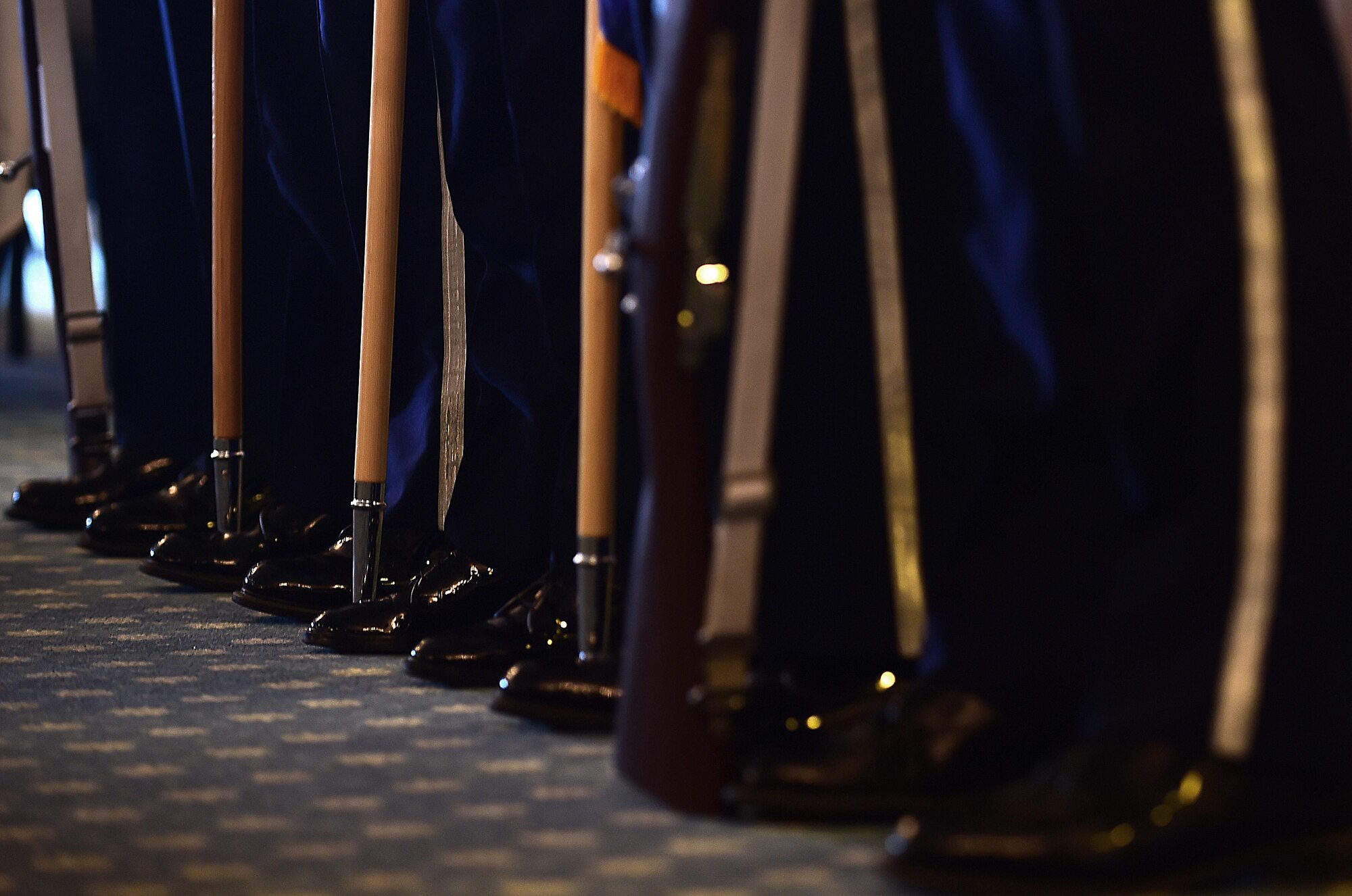 Members from the U.S. Air Force Langley Honor Guard prepare to present the colors during the National Prayer Luncheon at Joint Base Langley-Eustis, Va., Feb. 22, 2017. In addition to the honor guard, members of the U.S. Air Force Heritage of America Band performed during the lunch. (U.S. Air Force photo by Senior Airman Kimberly Nagle)