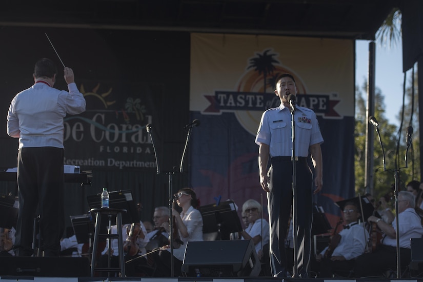 Master Sgt. Benjamin Park, U.S. Air Force Singing Sergeants ensemble baritone vocalist, performs "Ol' Man River" with Gulf Coast Symphony in Cape Coral, Fla., Feb. 26, 2017. The collaboration was the final performance in a weeklong community outreach tour for the Singing Sergeants. The ensemble performed a variety of popular hits from the 1940s and '50s, as well as a selection of classical choral literature, for audiences in central Florida. (U.S. Air Force photo by Airman 1st Class Rustie Kramer)