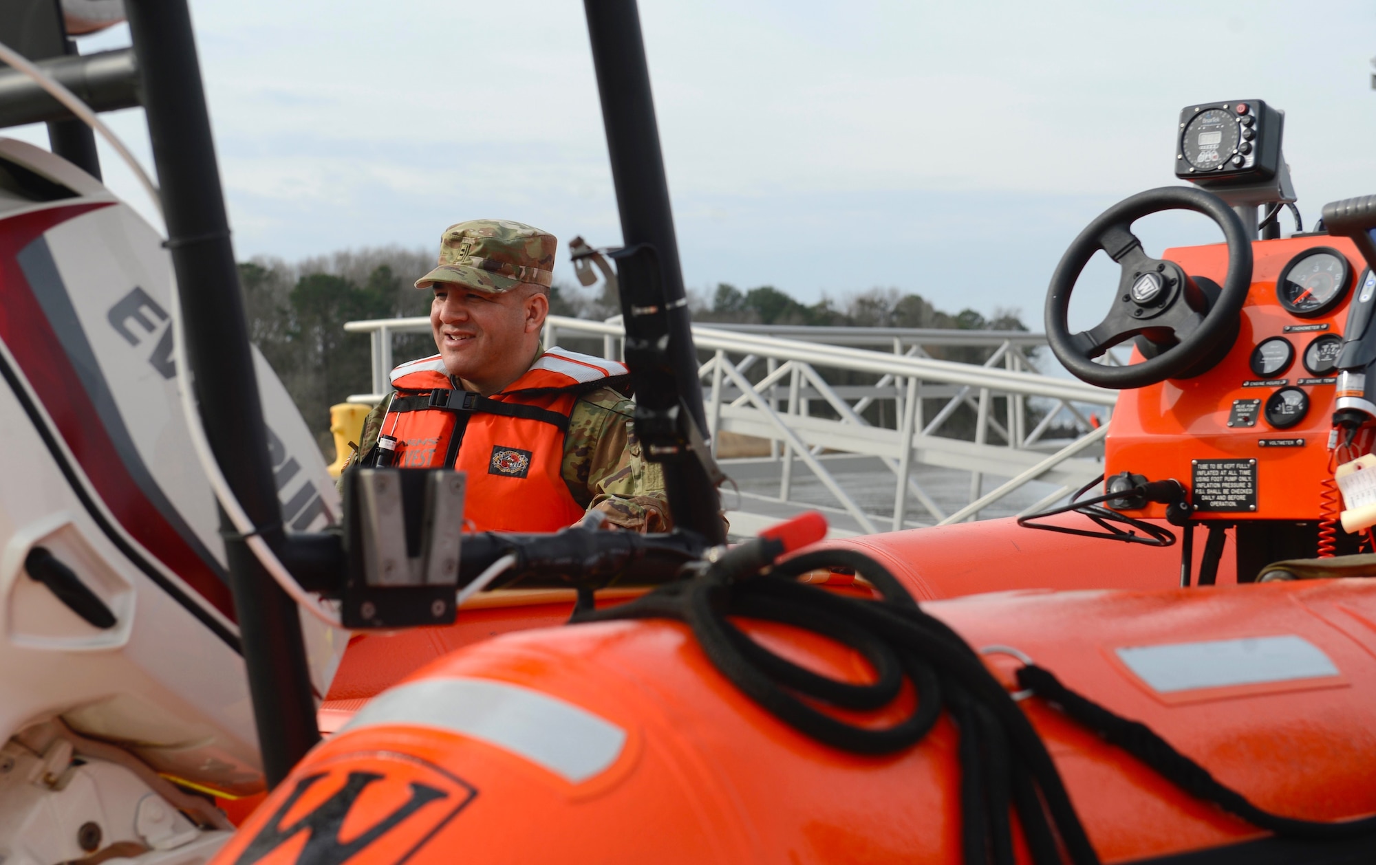 U.S. Army Chief Warrant Officer Randy Saucedo, 73rd Transportation Company, 10th Battalion, 7th Transportation Brigade (Expeditionary) chief engineer, prepares for a watercraft training at Third Port at Joint Base Langley-Eustis, Va., Feb. 22, 2017. The training included a boat operator certification course and port security exercises, which occurs daily at Third Port. (U.S. Air Force photo by Airman 1st Class Kaylee Dubois.)