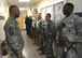 U.S. Air Force Chief Master Sgt. David Brown, 19th Air Force command chief, talks with members of the 97th Security Forces Squadron, Feb. 23, 2017, at Altus Air Force Base, Oklahoma. Brown met with a variety of Airmen from team Altus and learned how they contribute to the mission of forging combat mobility forces and deploying Airmen warriors. (U.S. Air Force Photo by Airman 1st Class Jackson N. Haddon/Released).