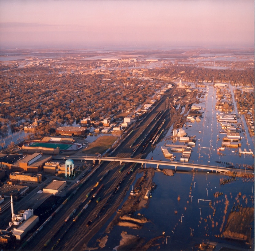Aerial photo of the flooded downtowns of Grand Forks, North Dakota, and East Grand Forks, Minnesota, on April 20, 1997. --USACE St. Paul District File Photo