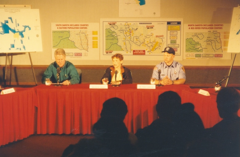 President Bill Clinton hosts a press conference in Grand Forks, North Dakota, April 21, 1997, after the city is inundated. --USACE St. Paul District file photo