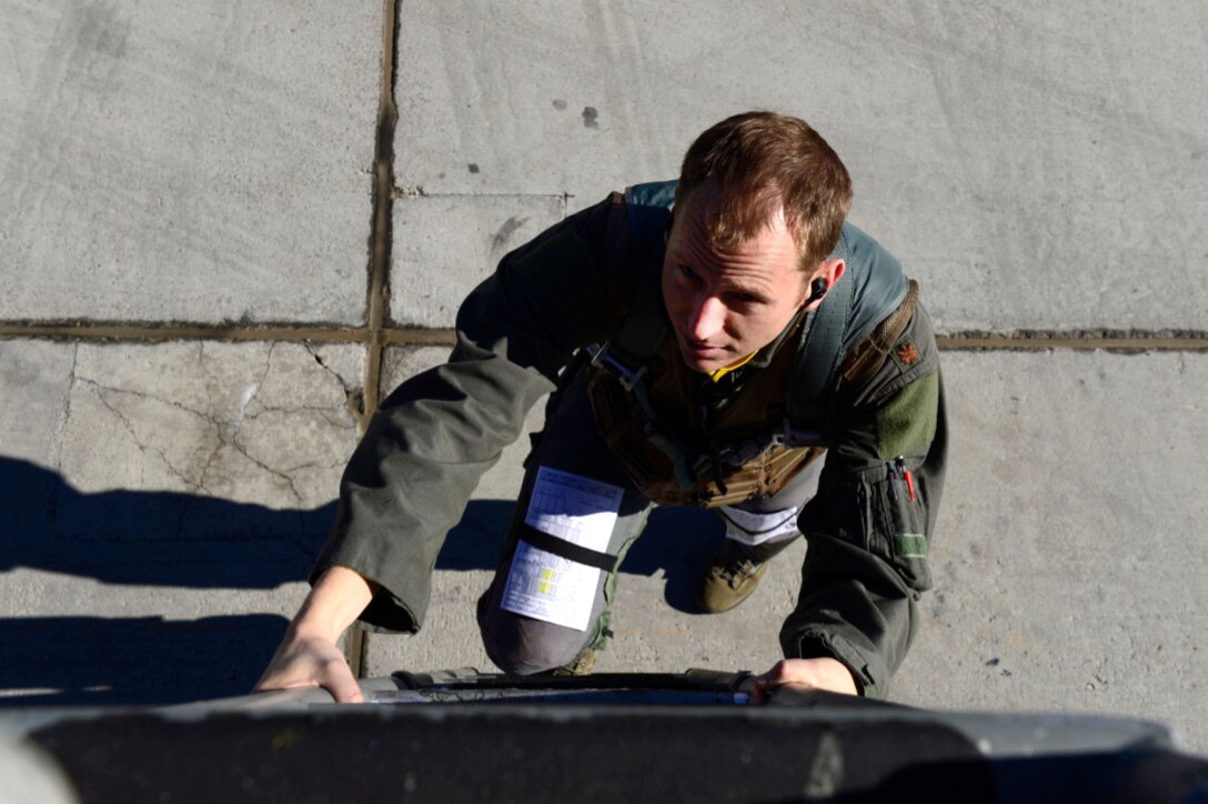 A 493rd Fighter Squadron climbs into his F-15C Eagle for a sortie in preparation for exercise Red Flag 17-2 at Nellis Air Force Base, Nev., Feb. 24. More than 440,000 service members have participated in Red Flag since 1975, including more than 145,000 air crew members flying more than 385,000 sorties and logging more than 660,000 flight hours. (U.S. Air Force photo/Senior Airman Malcolm Mayfield)