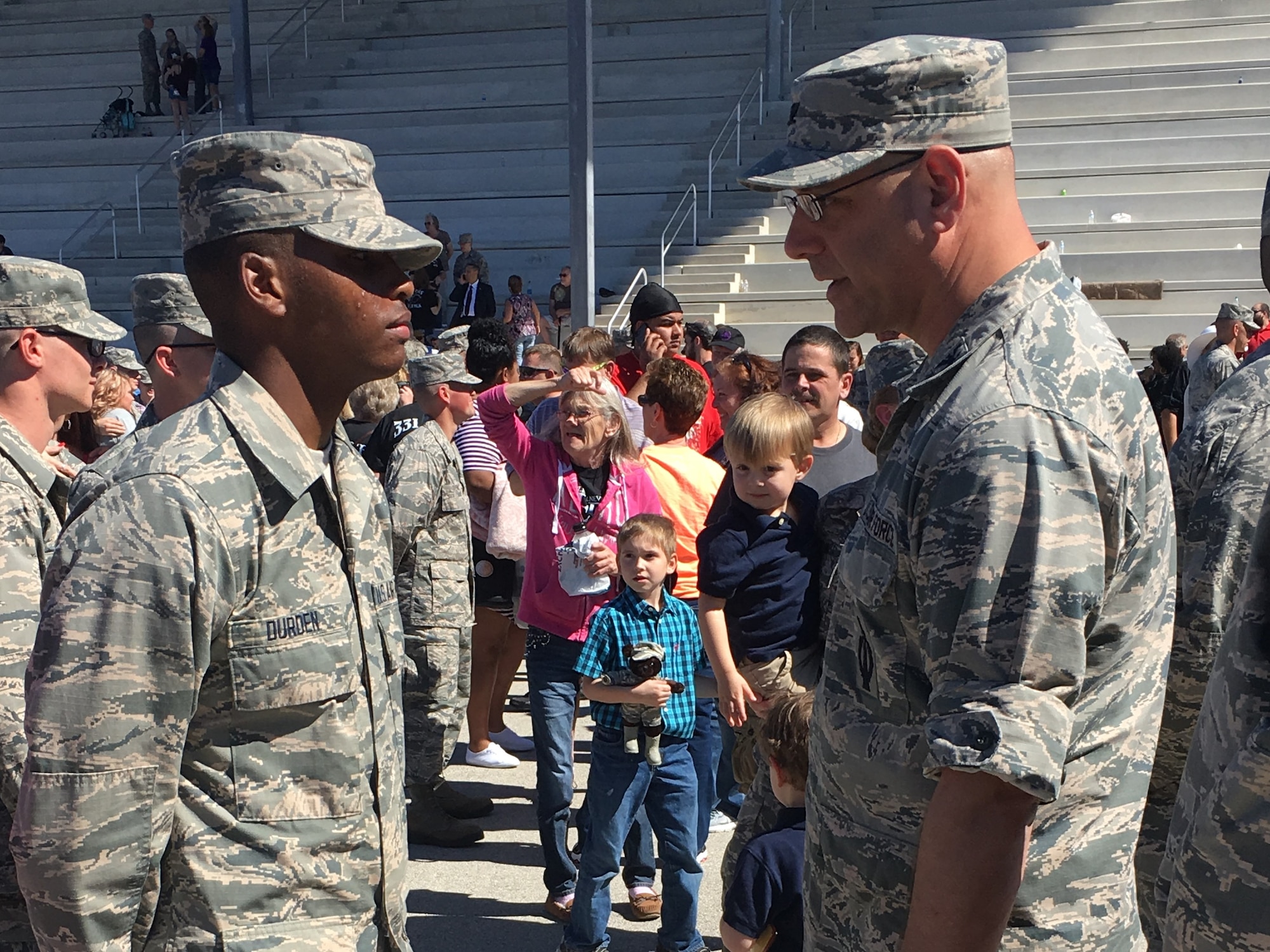 Col. Stephen Kravitsky, 90th Missile Wing commander, congratulates an Airman after the Coining Ceremony at Lackland Air Force Base, Texas, Feb. 23. The coining ceremony, during which Airmen receive their first military coin from their military training instructor, is one of the culminating events of a seven and a half week rigorous training program which all enlisted Airmen must complete upon entering the military. Kravitsky and a group of noncommissioned officers from F.E. Warren AFB, Wyo., participated in a two-day tour of BMT during which they attended the Airman’s Run, Coining Ceremony and Graduation Parade as well as tours of the newest training facilities on the installation. (U.S. Air Force Photo by 1st Lt Esther Willett)