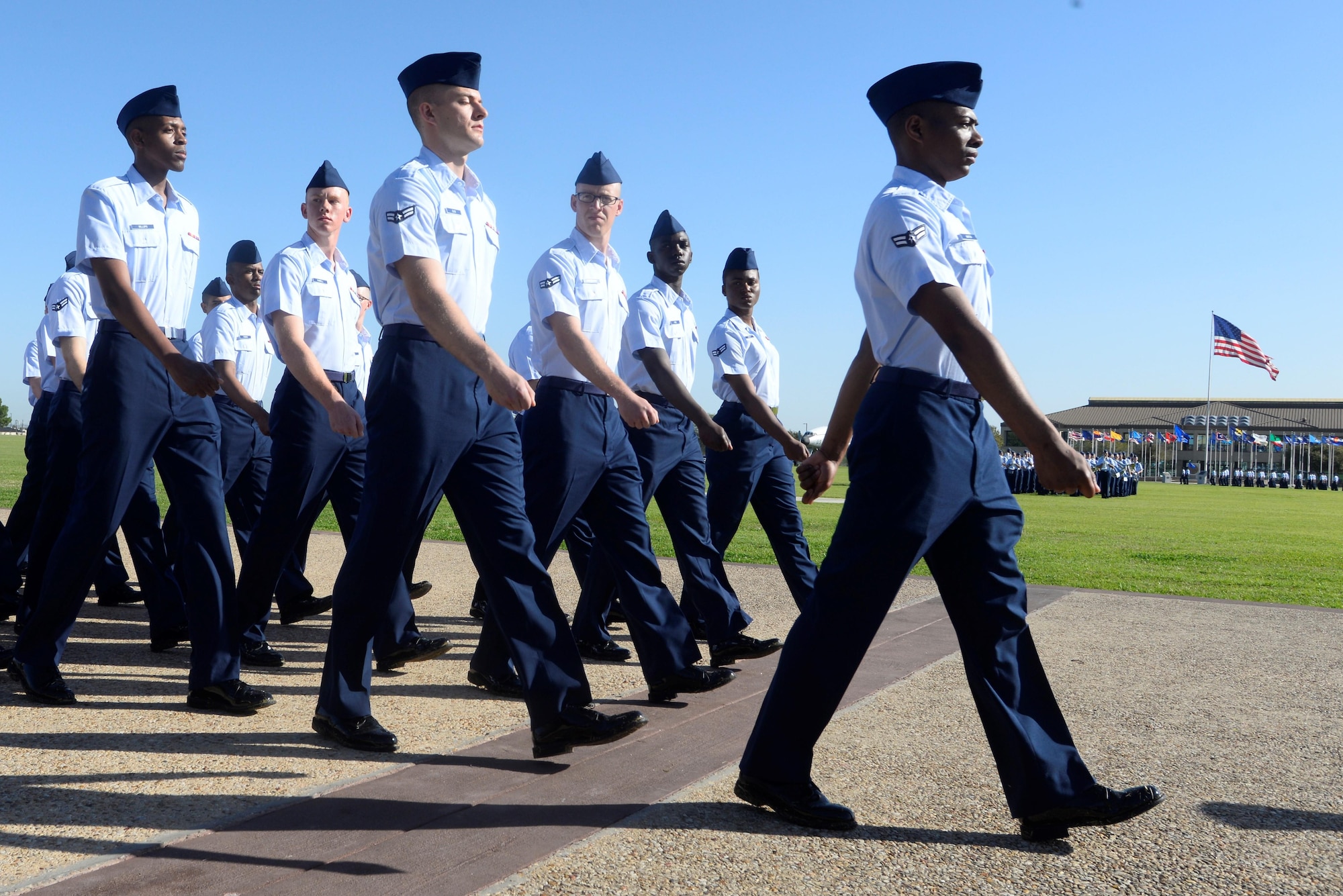 The Air Force’s newest Airmen march down the bomb run during their Basic Military Training Graduation Parade at Lackland Air Force Base, Texas, Feb. 24. The parade is the culminating event of a seven and a half week rigorous training program which all enlisted Airmen must complete upon entering the military. (U.S. Air Force Photo by 1st Lt Esther Willett)