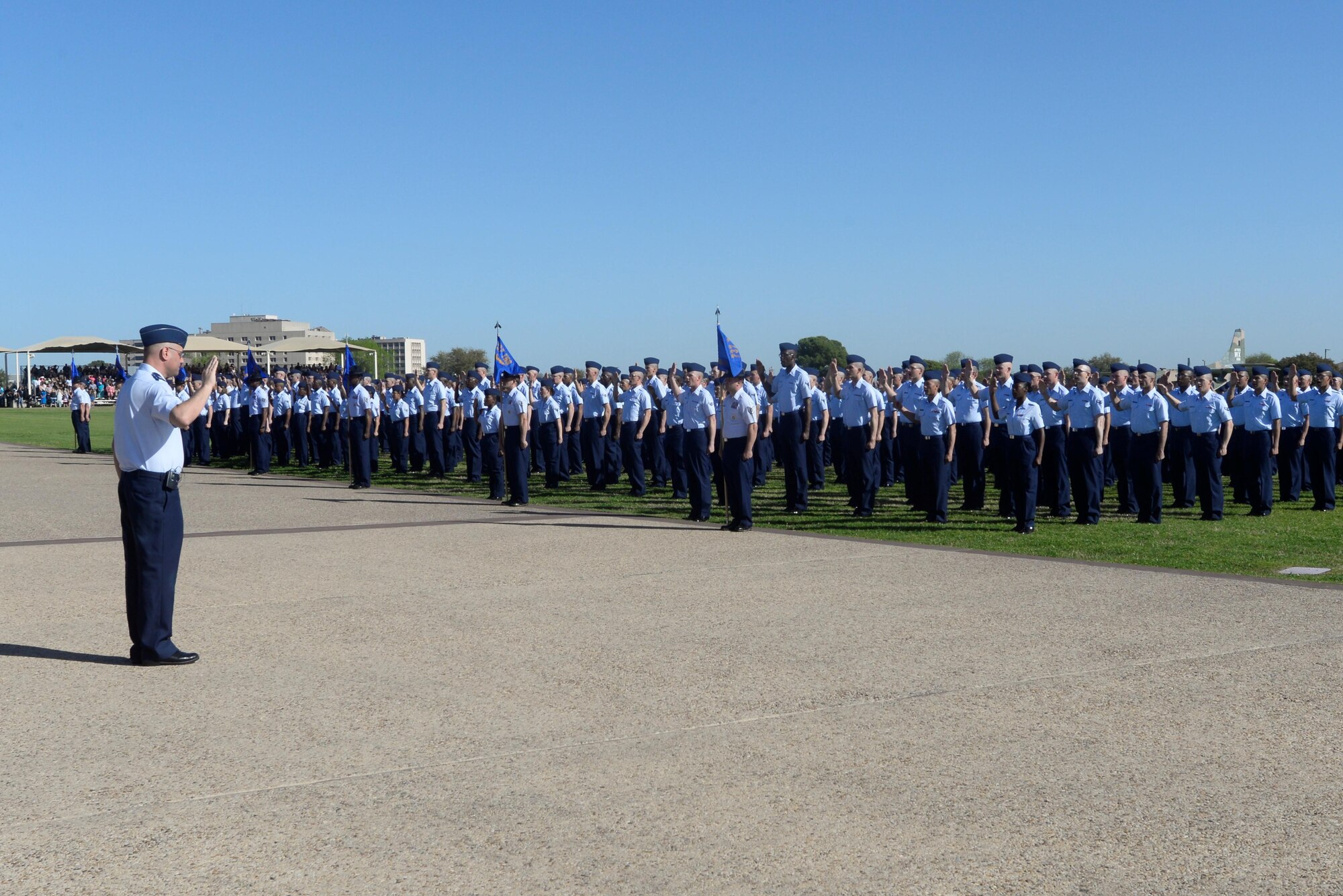 Col. Stephen Kravitsky, 90th Missile Wing commander, administers the Oath of Enlistment to 747 of the Air Force’s newest Airmen as the Reviewing Official of the Basic Military Training Graduation Parade at Lackland Air Force Base, Texas, Feb. 24. The parade was the culminating event of a two-day tour of BMT during which noncommissioned officers from F.E. Warren AFB, Wyo., attended the Airman’s Run, Coining Ceremony and Graduation Parade as well as tours of the newest training facilities on the installation. (U.S. Air Force Photo by 1st Lt Esther Willett)