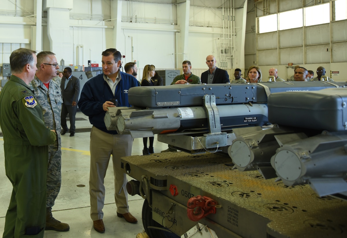 NAVAL AIR STATION FORT WORTH JOINT RESERVE BASE, Texas -- Sen. Ted Cruz (R-Texas) visits with 301st Fighter Wing Commander, Col. Gregory Jones and Chief Master Sgt. Tod Bell, the 301st Aircraft Maintenance Squadron's superintendent during a tour at Naval Air Station Fort Worth Joint Reserve Base, Texas, Feb. 24, 2017. While at the base, the senator received a briefing from senior leaders and met with various 301 FW units. (U.S. Air Force photo by Tech. Sgt. Melissa Harvey)