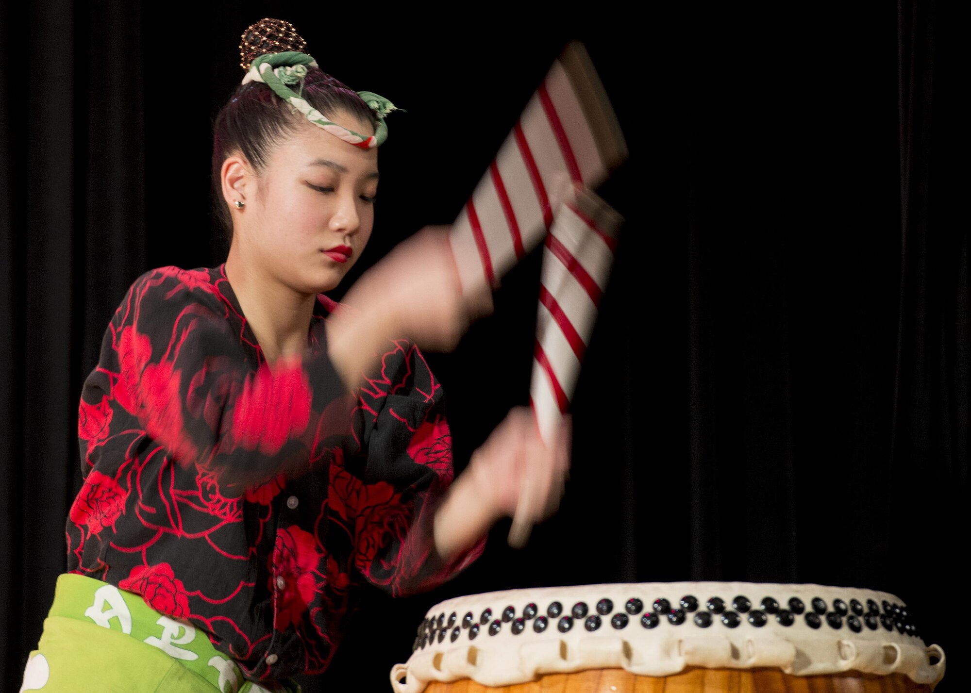 A member of the Yokota Samurai Daiko performs a drum solo during the Japan-U.S. Joint Concert Feb. 18, 2017, at the Mizuho View Park Sky Hall in Mizuho, Tokyo, Japan. The Yokota Samurai Daido is made up of Yokota military, civilians and Japanese employees who play a traditional Japanese drumming called wadaiko, with the intent to reach out and deepen friendships between the communities around Yokota Air Base. (U.S. Air Force photo by Airman 1st Class Donald Hudson)